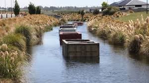 Innovative Use of Shipping Containers Tackles Algae in Ashburton's Lake Hood Canals