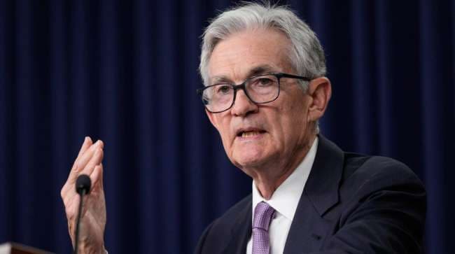 Interest Rate Decisions: Federal Reserve's Patient Approach Amid Economic Pressures