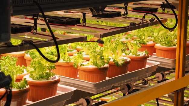 Co-locating vertical farming with aquaponics and greenhouse farming: water reuse and energy dynamics
