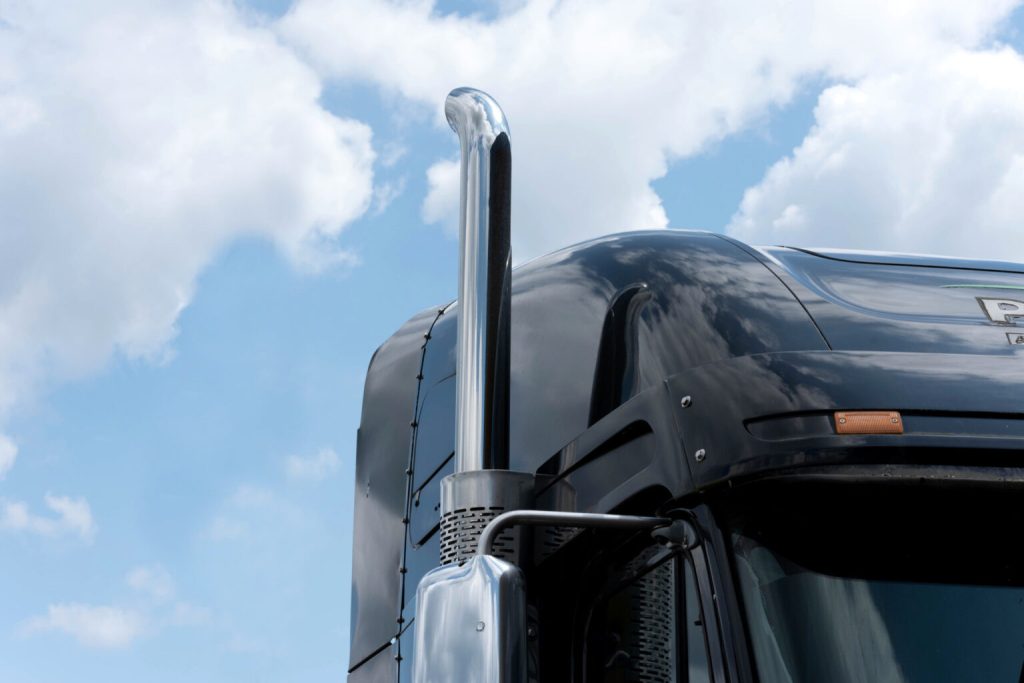 Impact of Truck Emission Regulation Changes on Manufacturing and Logistics