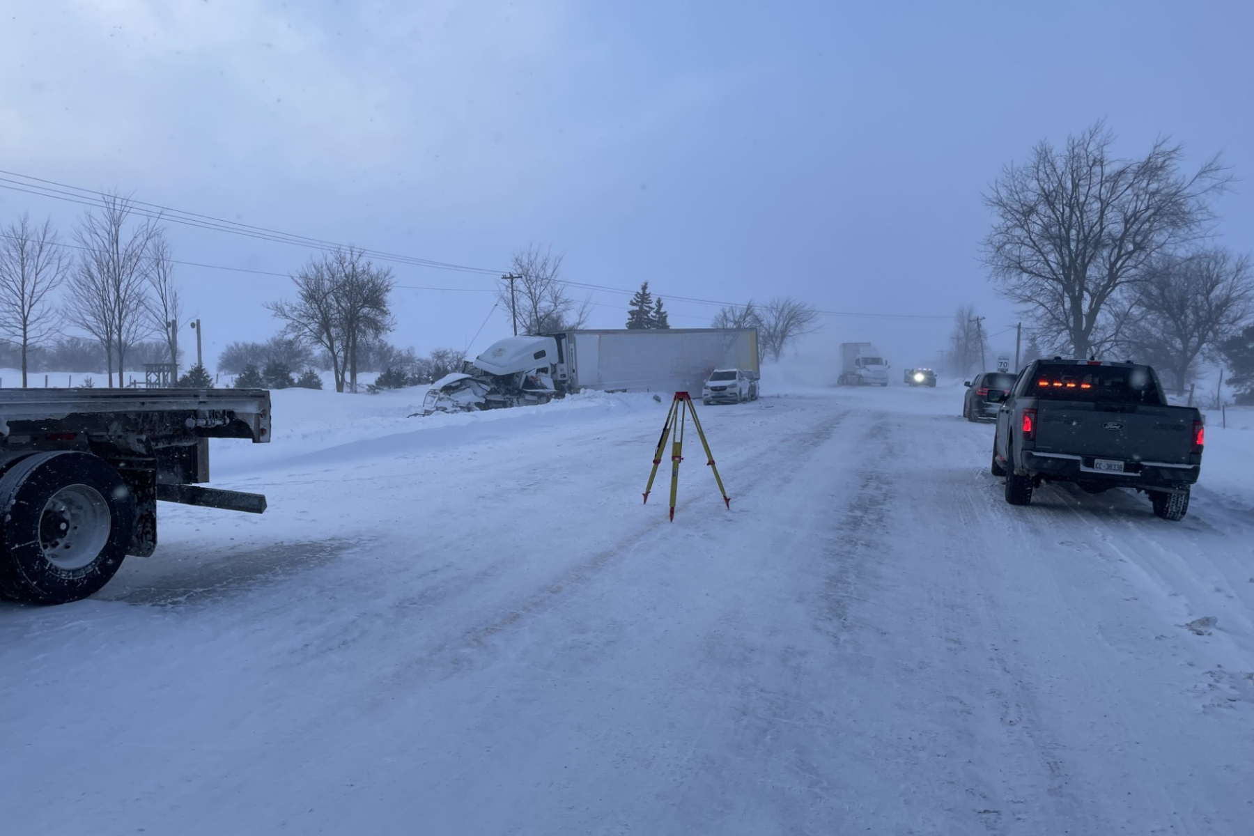 Transport trucks collide on Line 86 near Chalmers Forest Road; driver charged after secondary impact